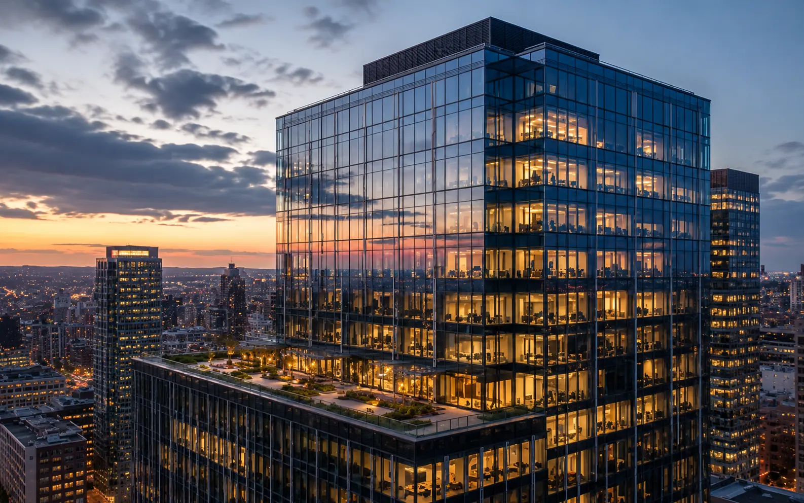 A downtown office tower at dusk